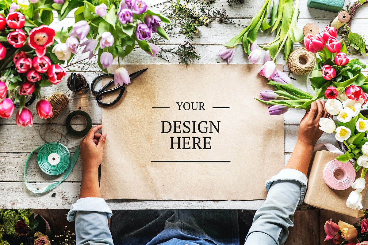 Free Florist Showing Empty Design Space Paper On Wooden Table With Fresh Flowers Decorate